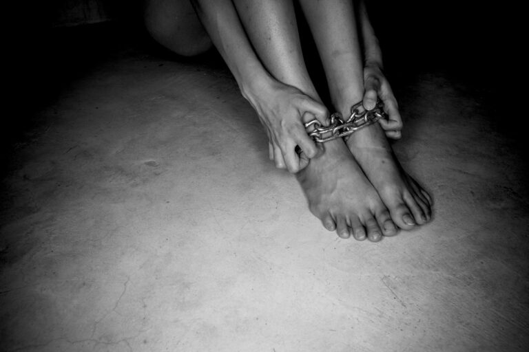 Bare Feet of a woman with Chain